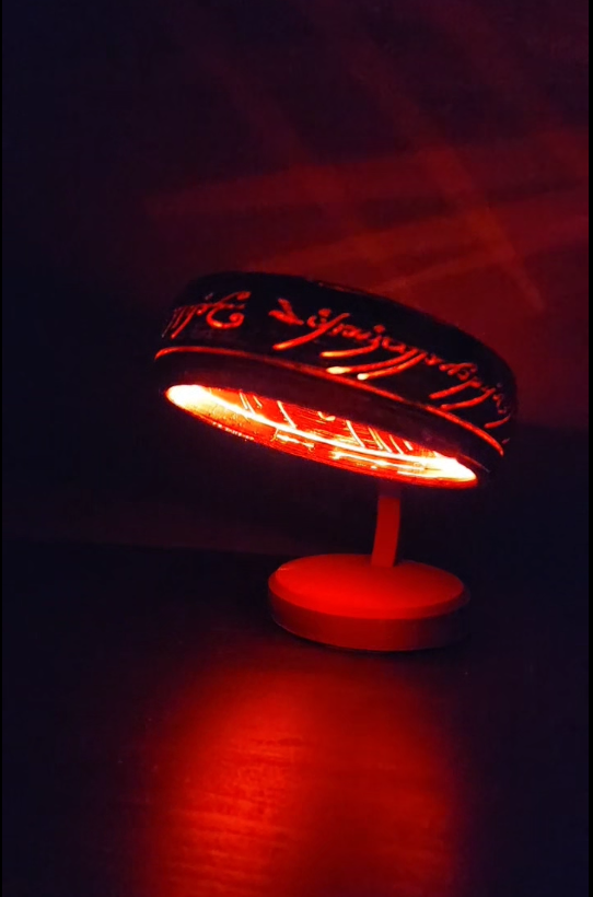 Photo of the ring from Lord of the Rings as a lamp, lit up with Red LEDs